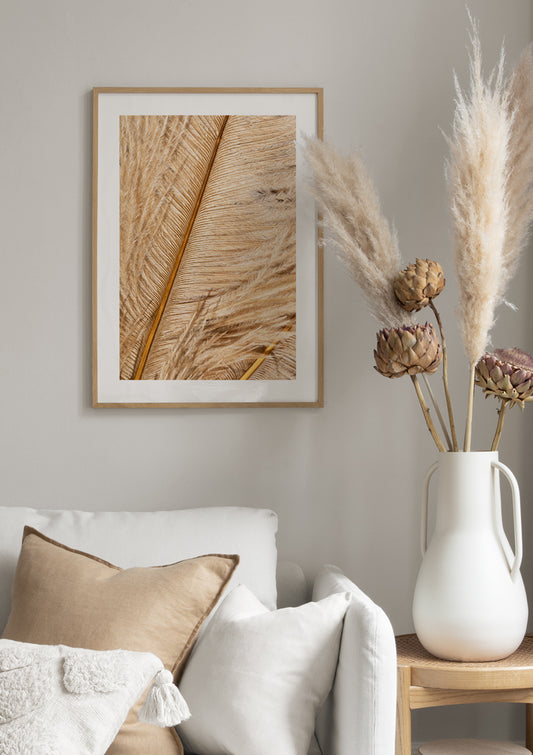 Watercolor golden feather poster for nursery and home wall decor.
