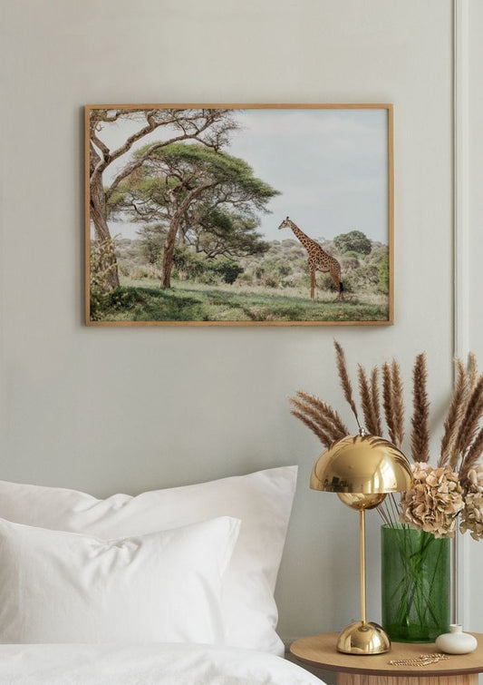 Watercolor giraffe in landscape poster for nursery and home wall decor.