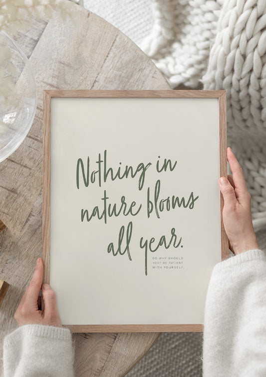 Watercolor nothing blooms all year poster for nursery and home wall decor.